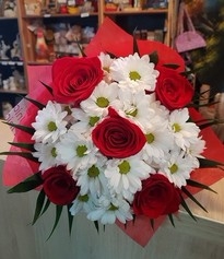Bouquet of red roses and white chrysanthemums