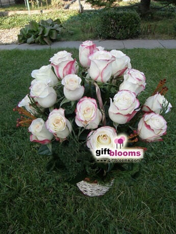 Flower arrangement in a Basket 25 White Roses
