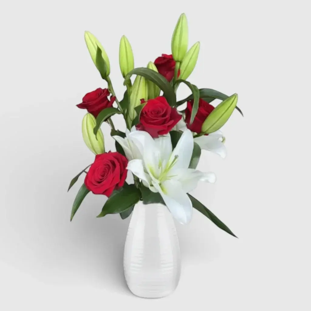 Bouquet of 5 red roses and 2 white lilies
