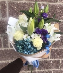 Bouquet of roses, lilies, eustoma