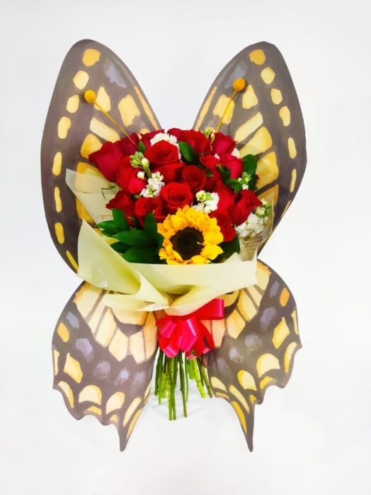 Beautiful butterfly bouquet with roses  and sunflowers