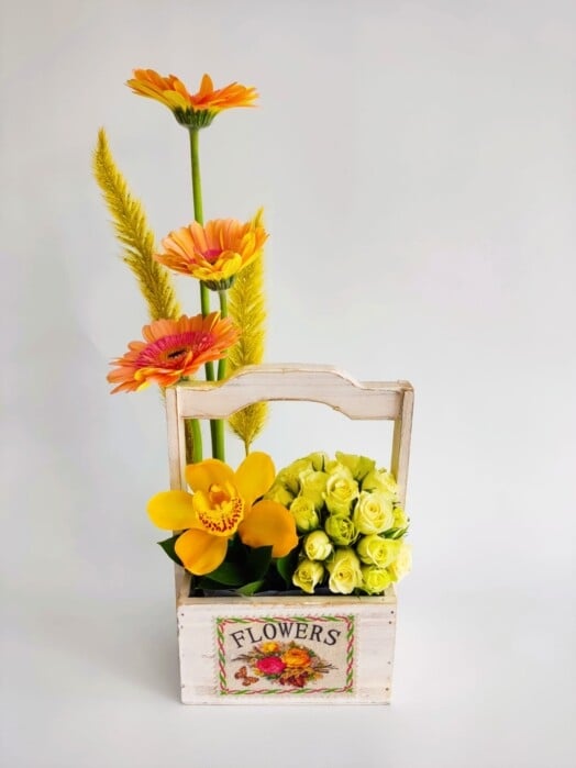Beautiful orchid with mini roses and gerberas