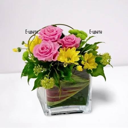 Arrangement with roses and chrysanthemums