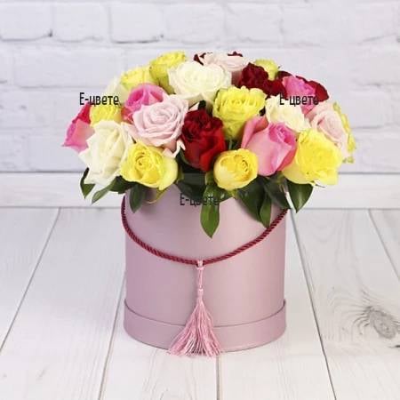 35 roses in a round box