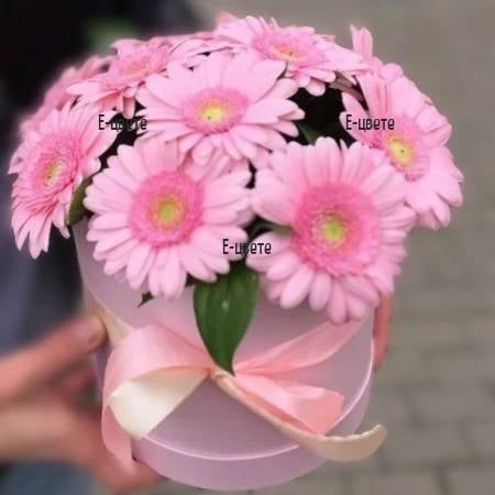 11 pink gerberas in round box