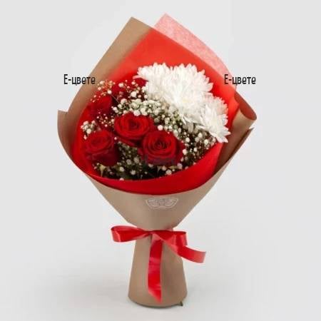 A bouquet of roses and chrysanthemums