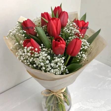 A bouquet of 9 red tulips