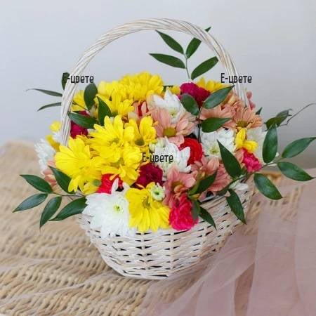 Basket with colorful flowers